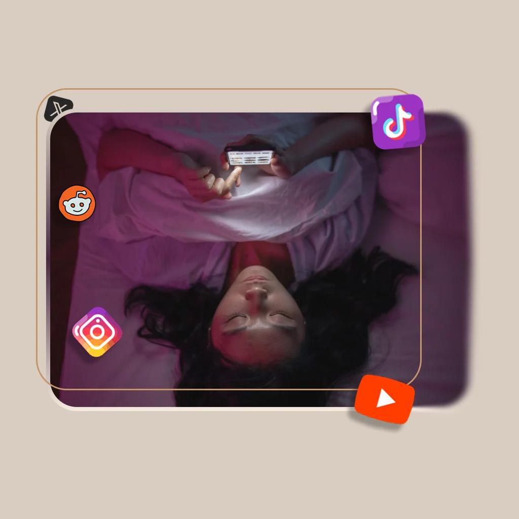 Someone lying in bed scrolling on their phone, surrounded by floating social media app icons.